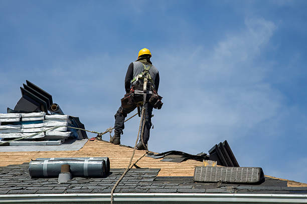 Professional Storm Damage Roof Repair technician working in Bellefonte, DE